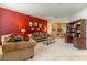 Spacious living room showcasing a large sofa, and open layout for entertaining and relaxation at 1933 Darlin Cir, Orlando, FL 32820