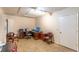 Office space featuring a large desk, office chair, and two extra chairs at 1933 Darlin Cir, Orlando, FL 32820