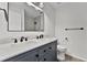 Bathroom boasts double sinks with marble countertops and sleek, modern fixtures at 2 Rollingwood Trl, Deland, FL 32724
