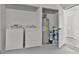 Laundry room with washer, dryer, and hot water heater at 2 Rollingwood Trl, Deland, FL 32724