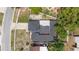 Aerial top shot showcasing the property's roof, fenced yard, and proximity to surrounding homes at 229 Bitterwood St, Winter Springs, FL 32708