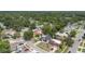 Bird's eye view of a tree-lined residential area with houses and roadways at 229 Bitterwood St, Winter Springs, FL 32708