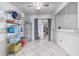 Bright dining area featuring a ceiling fan, tile floors, and sliding doors to the backyard at 229 Bitterwood St, Winter Springs, FL 32708