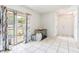 Bright living room area includes tile floor and sliding glass door with backyard view at 229 Bitterwood St, Winter Springs, FL 32708