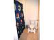 Bathroom view featuring a Toy Story-themed shower curtain and a standard white toilet with step at 3074 Royal Tern Dr, Winter Haven, FL 33881