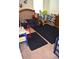 bedroom featuring a wooden crib, colorful toys, and playful decor on the wall at 3074 Royal Tern Dr, Winter Haven, FL 33881