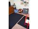 bedroom with toys, football decor and comfortable seating at 3074 Royal Tern Dr, Winter Haven, FL 33881