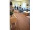 Bright living room with open layout to the kitchen and dining area, creating a welcoming space at 3074 Royal Tern Dr, Winter Haven, FL 33881