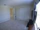 Bedroom featuring a closet and natural light at 3308 Rodrick Cir, Orlando, FL 32824