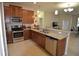 Well-equipped kitchen featuring stainless steel appliances and granite countertops at 3308 Rodrick Cir, Orlando, FL 32824