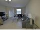 Spacious living room with dining area that offers modern furnishings and neutral tones at 3308 Rodrick Cir, Orlando, FL 32824