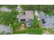 An aerial view of home, pool, solar panels and meticulously maintained yard at 3372 Bellington Dr, Orlando, FL 32835