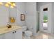 Bathroom featuring a glass shower, light colored walls and tile, and an exterior door at 3372 Bellington Dr, Orlando, FL 32835