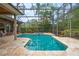 Enjoy the screened pool area, complete with a hot tub, lush landscaping, and plenty of space for outdoor relaxation at 3372 Bellington Dr, Orlando, FL 32835