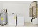Laundry area with washer, dryer, and water heater at 340 Edgewood Ct, Kissimmee, FL 34759