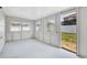 The white enclosed porch provides a cozy outdoor space at 340 Edgewood Ct, Kissimmee, FL 34759