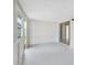Bright sunroom with access to backyard via sliding glass doors; perfect for indoor-outdoor living and relaxing at 340 Edgewood Ct, Kissimmee, FL 34759