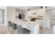 Open concept kitchen with large island and breakfast bar seating at 3519 Mcway Falls Ct, Davenport, FL 33837