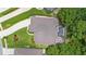 Aerial view of the roof, driveway, landscaping and screened pool at 3593 Scoutoak Loop, Oviedo, FL 32765