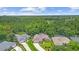 A beautiful view of the home's exterior and large tree coverage at 3593 Scoutoak Loop, Oviedo, FL 32765
