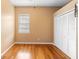 Bright bedroom with hardwood floors, a closet, and abundant natural light at 3593 Scoutoak Loop, Oviedo, FL 32765