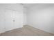 Bedroom features carpet, closet, white walls, and neutral trim at 417 Tisone Ln, Davenport, FL 33837