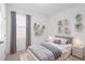 Cozy bedroom offering a twin-sized bed, neutral colors, and charming decorative accents at 417 Tisone Ln, Davenport, FL 33837