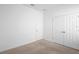 Bedroom features carpet, white walls and trim, and a closet at 417 Tisone Ln, Davenport, FL 33837