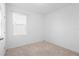 Bedroom with carpet, light walls, and natural light from the window at 417 Tisone Ln, Davenport, FL 33837