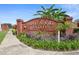 Davenport Estates brick sign surrounded by manicured landscaping at 417 Tisone Ln, Davenport, FL 33837