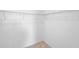 Empty walk-in closet with wire shelving and neutral carpet flooring at 417 Tisone Ln, Davenport, FL 33837