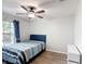 Bedroom with window, ceiling fan, and closet at 4611 Cumbrian Lakes Dr, Kissimmee, FL 34746