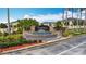 Stone Cumbrian Lakes community sign surrounded by tiered water feature and verdant landscaping at 4611 Cumbrian Lakes Dr, Kissimmee, FL 34746