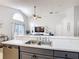 Bright, open kitchen with stainless appliances, and a breakfast bar perfect for entertaining at 4611 Cumbrian Lakes Dr, Kissimmee, FL 34746