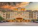 Stunning building exterior with a fountain and meticulously maintained landscaping creates an inviting curb appeal at 500 Mirasol Cir # 203, Celebration, FL 34747