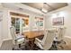 Well-appointed conference room with a large wooden table, comfortable seating, and natural light at 500 Mirasol Cir # 203, Celebration, FL 34747