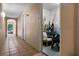 Hallway leading to a storage room full of boxes and other items at 500 Mirasol Cir # 203, Celebration, FL 34747