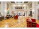 Spacious lobby with soaring ceilings, elegant architecture, and comfortable seating areas at 500 Mirasol Cir # 203, Celebration, FL 34747