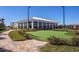 Modern community center with a putting green, offering recreational amenities and a gathering space at 5081 Twin Lakes Blvd, St Cloud, FL 34772