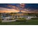 Clubhouse and pool at sunset. The perfect place to relax and unwind after a long day at 5081 Twin Lakes Blvd, St Cloud, FL 34772