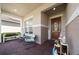 Inviting front porch with comfortable seating, decorative accents, and a charming entryway at 5081 Twin Lakes Blvd, St Cloud, FL 34772