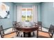 Inviting game room with a round card table, chips, and comfortable seating, perfect for entertainment at 5081 Twin Lakes Blvd, St Cloud, FL 34772