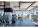 Well-equipped gym with modern machines, exposed wood beams, and large windows offering bright, natural light at 5081 Twin Lakes Blvd, St Cloud, FL 34772
