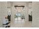 Grand lobby featuring modern design, stone walls, stylish lighting, comfortable seating areas, and a bright, open space at 5081 Twin Lakes Blvd, St Cloud, FL 34772