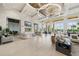 Expansive lobby with stylish furniture, modern lighting, TV, and large windows that offer view of swimming pool and landscape at 5081 Twin Lakes Blvd, St Cloud, FL 34772