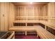 Wooden sauna with multi-tiered benches providing a tranquil and relaxing spa-like experience at 5081 Twin Lakes Blvd, St Cloud, FL 34772