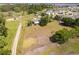 Aerial view highlighting the property, a large lot, and surrounding landscape at 5365 Rambling Rd, St Cloud, FL 34771