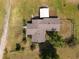 Aerial view of the house showing roof, yard, landscaping, and surrounding trees at 5365 Rambling Rd, St Cloud, FL 34771