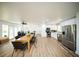 Open-concept living space with modern kitchen, dining area, and comfortable workspace, perfect for versatile living at 5365 Rambling Rd, St Cloud, FL 34771