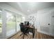 Bright office space with large window and door leading to the backyard at 5365 Rambling Rd, St Cloud, FL 34771